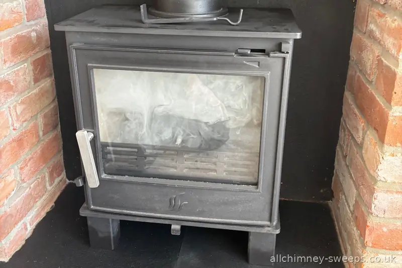 Smoke test carried out after chimney sweep prior to issuing NACS certificate — annual chimney sweeping service, Allchimney Sweeps, Brentwood