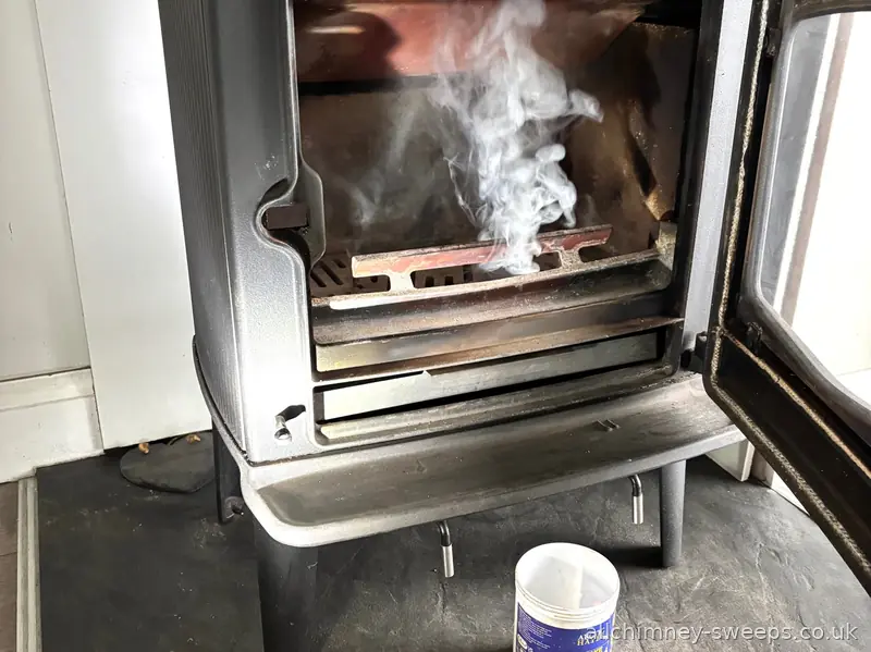 Smoke test on twin wall insulated flue system — NACS certificate issued after every sweep, professional chimney sweeping service, Allchimney Sweeps, Harold Wood