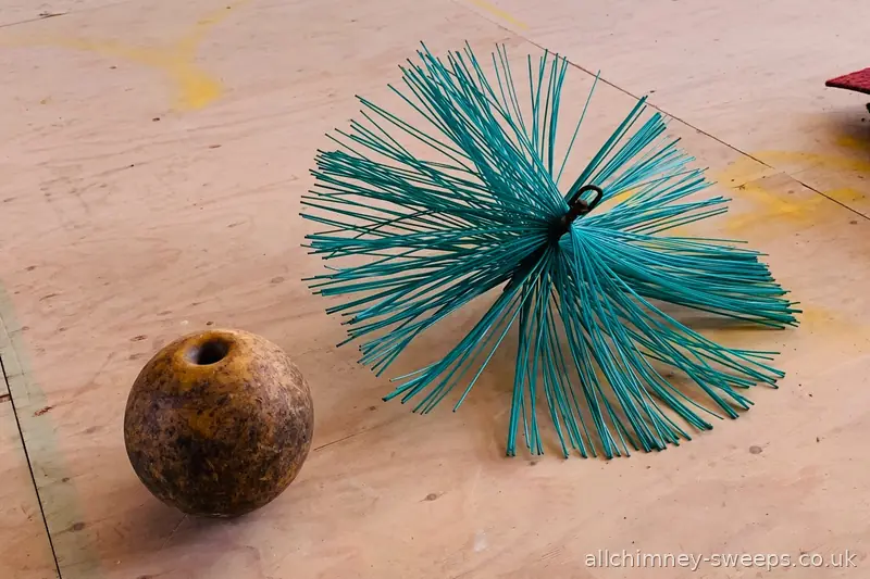 Chimney sweep brush and 200mm core ball for flue diameter inspection — Allchimney Sweeps, Gidea Park Romford